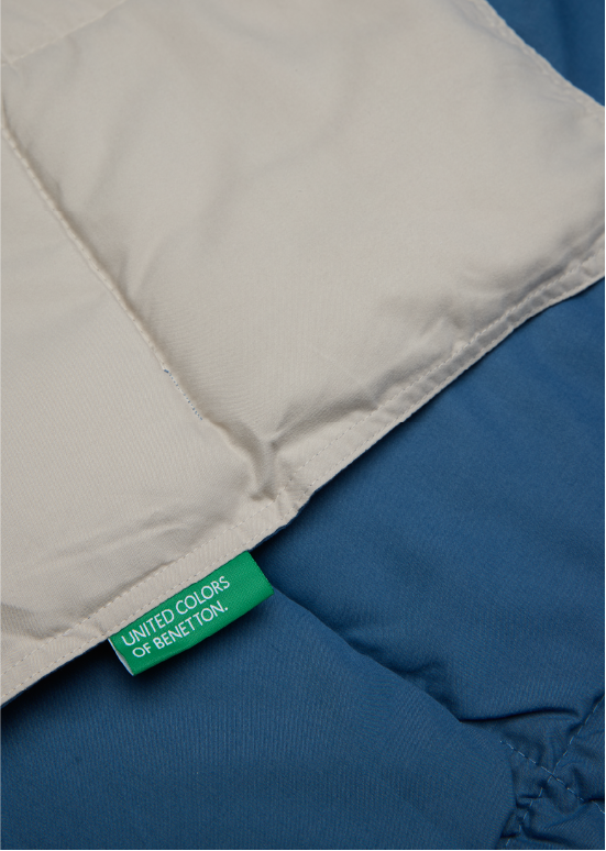 שמיכת מעבר דו־צדדית Benetton - פטרול/אבן